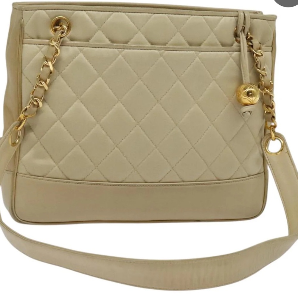 CHANEL Beige Quilted Shoulder Bag with Gold Accents